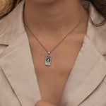 Silver the star tarot necklace with cubic zirconia accents and an onyx  back stone, symbolizing hope, inspiration, and spiritual guidance 