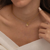 Gold Custom Sunburst Initial Necklace with custom birthstones. Perfect for everyday wear, waterproof and tarnish free
