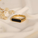 tarnish free waterproof onyx signet ring in gold with rectangle cut stone. 