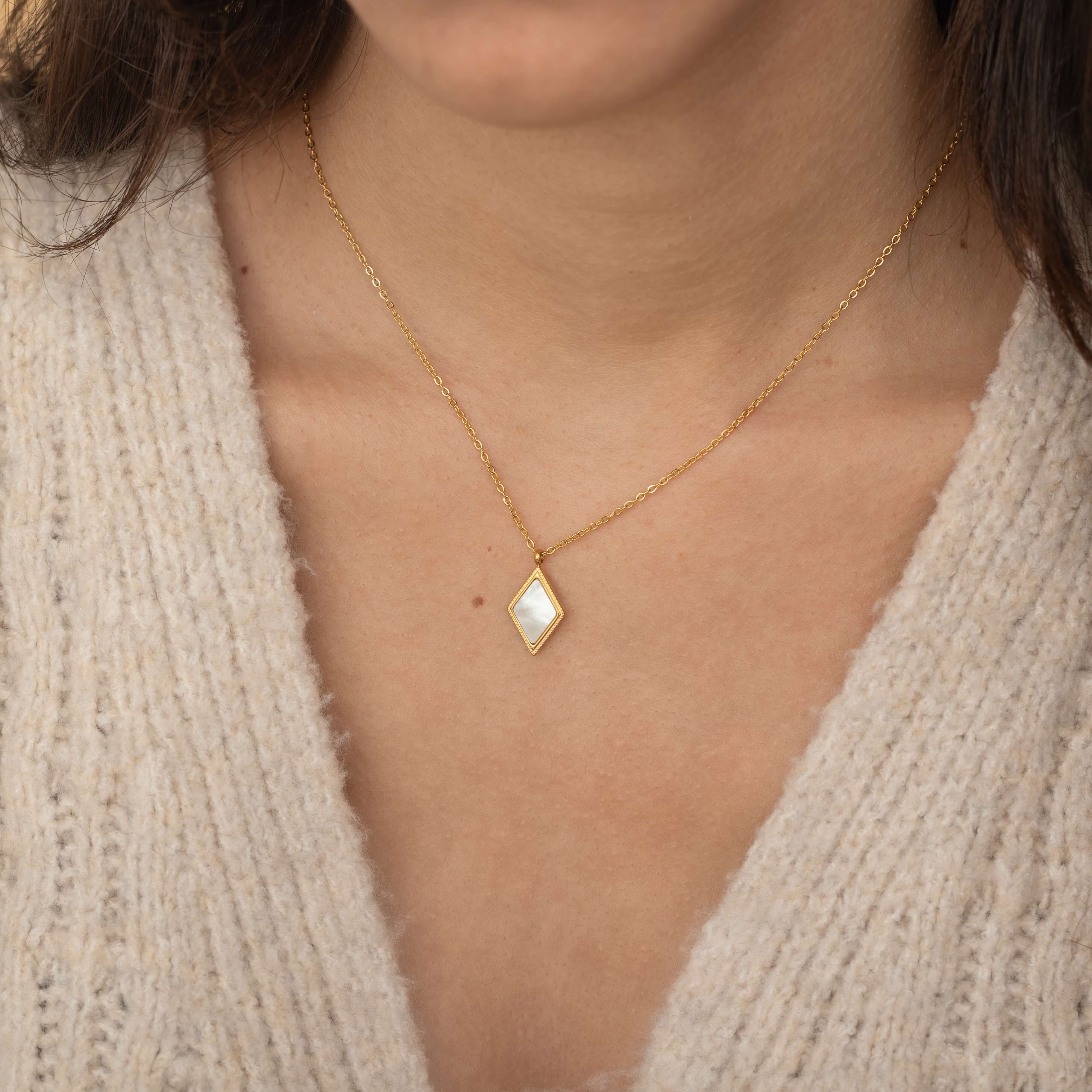 gold mother of pearl pendant on a cable gold chain necklace for women