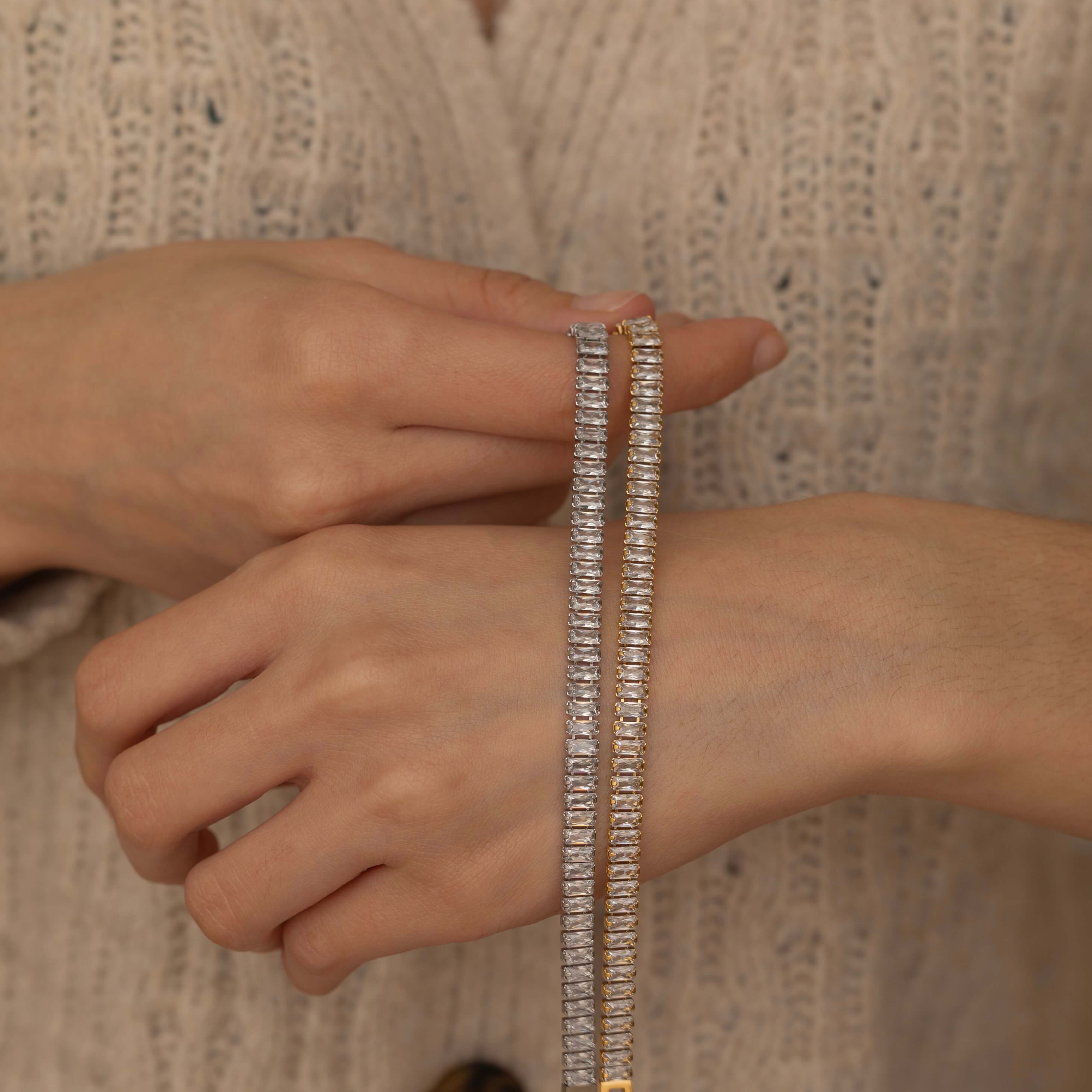 Close-up of a gold tennis bracelet with high-quality stones, perfect for adding a touch of glamour to any outfit.