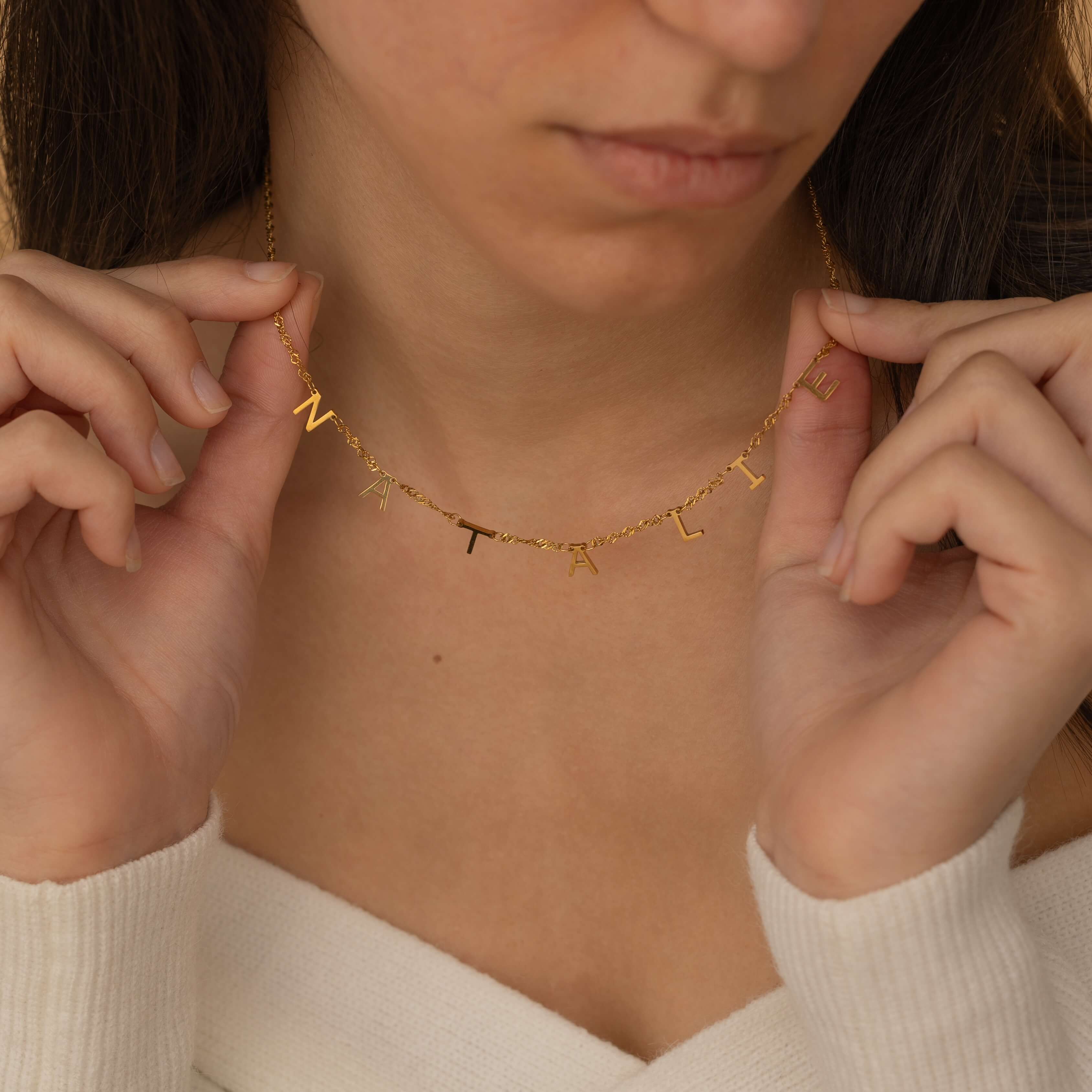 dainty gold spaced name necklace with twist chain 
