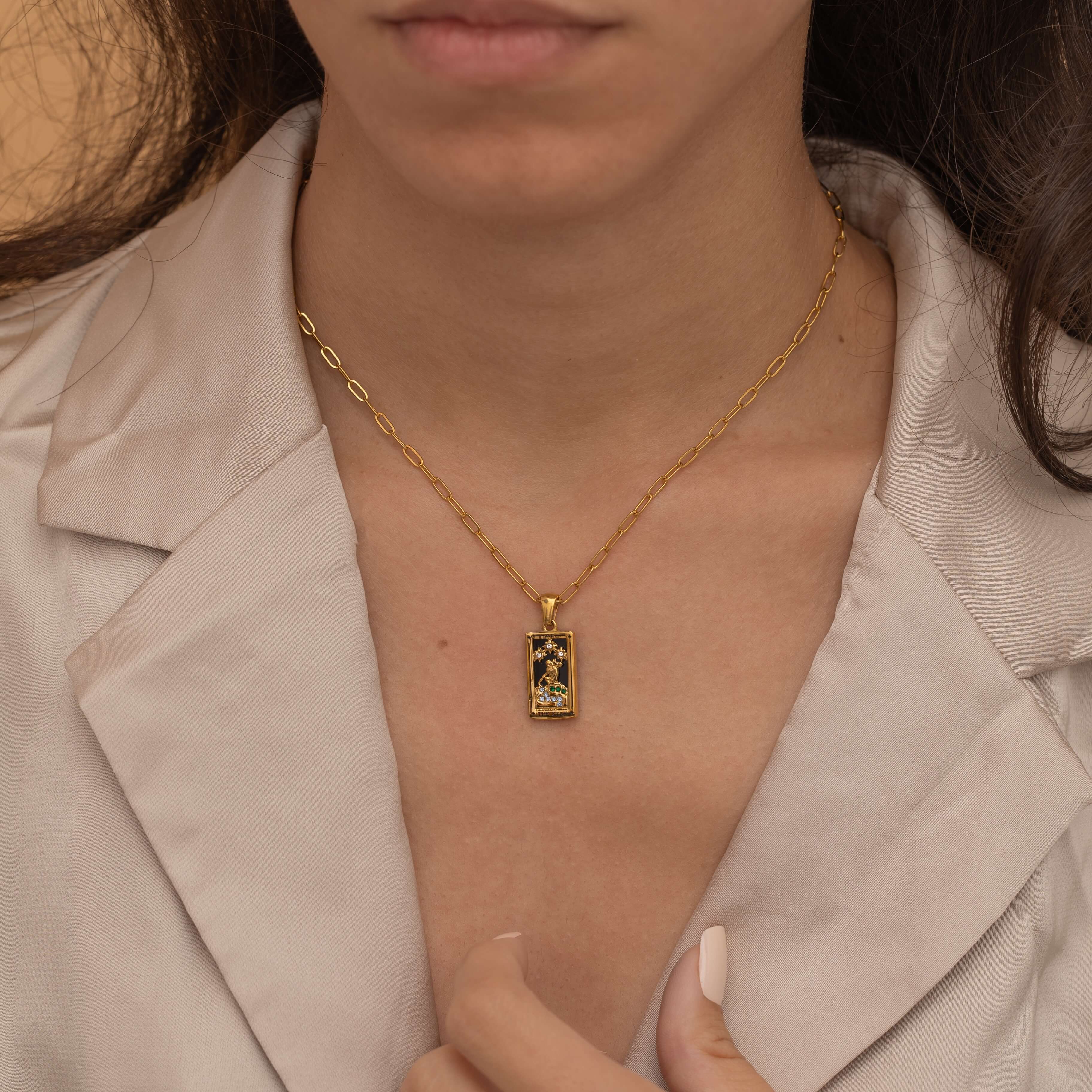  Gold the star tarot necklace with cubic zirconia accents and an onyx  back stone, symbolizing hope, inspiration, and spiritual guidance 