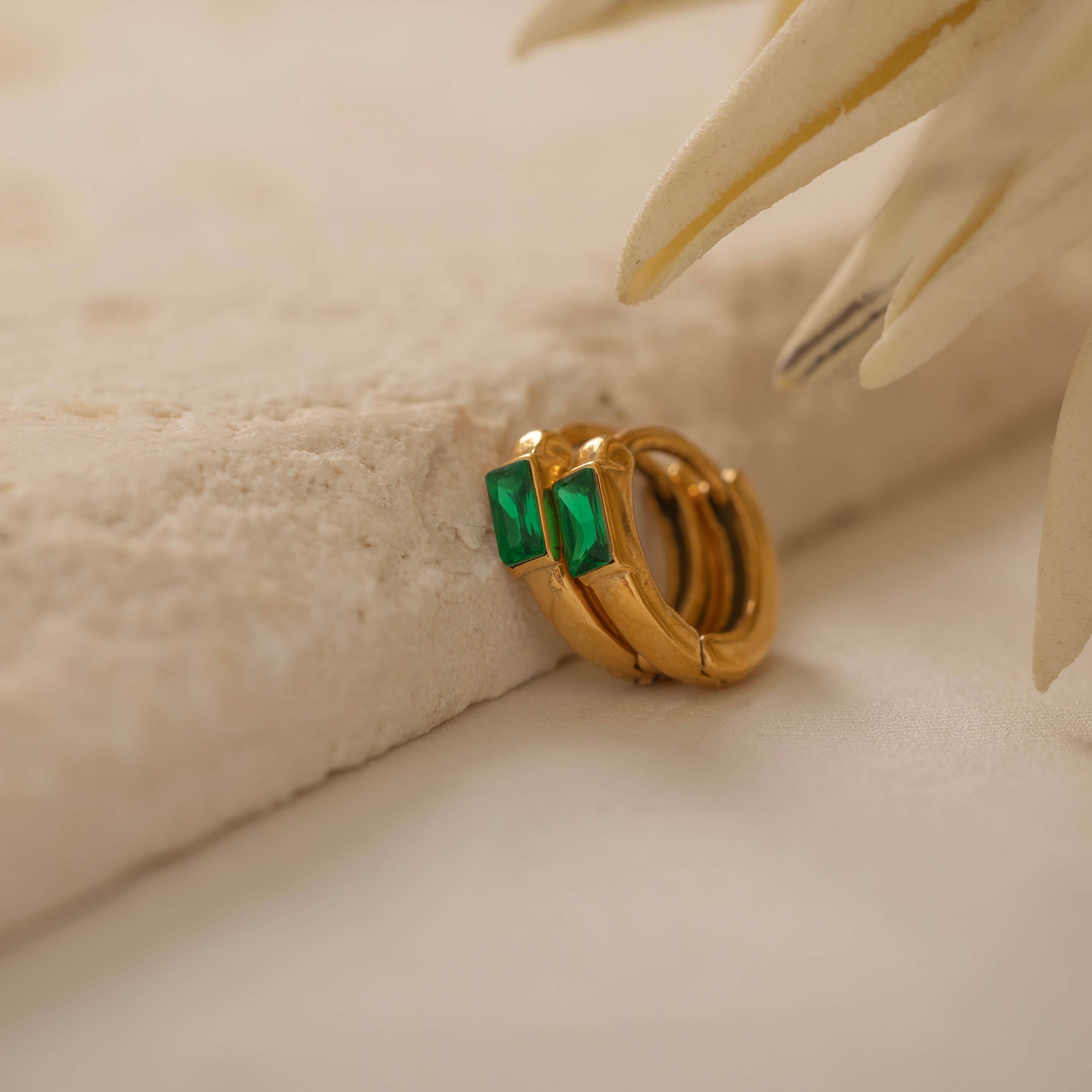 emerald baguette huggie earrings