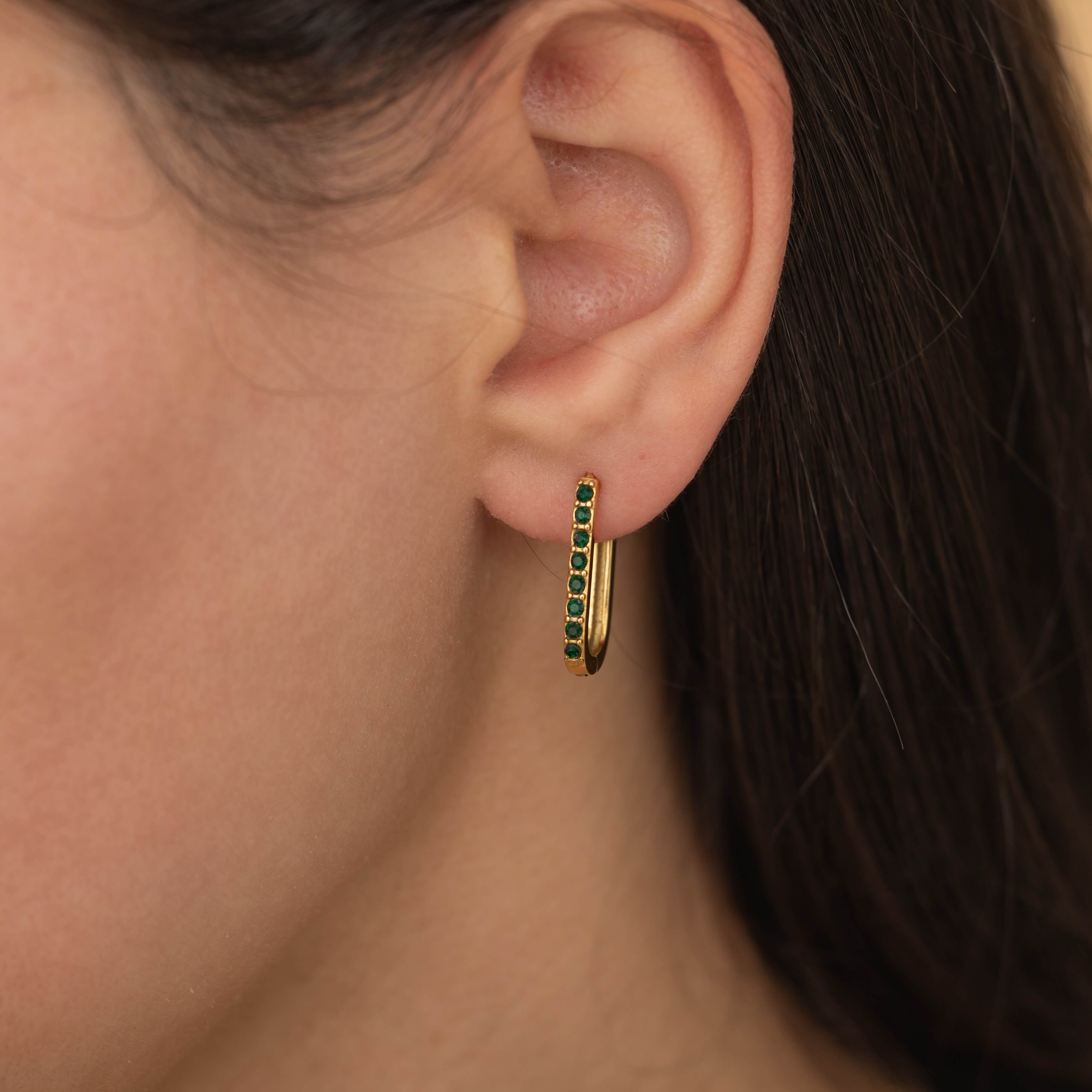 gold emerald paperclip gemstone hoop earrings