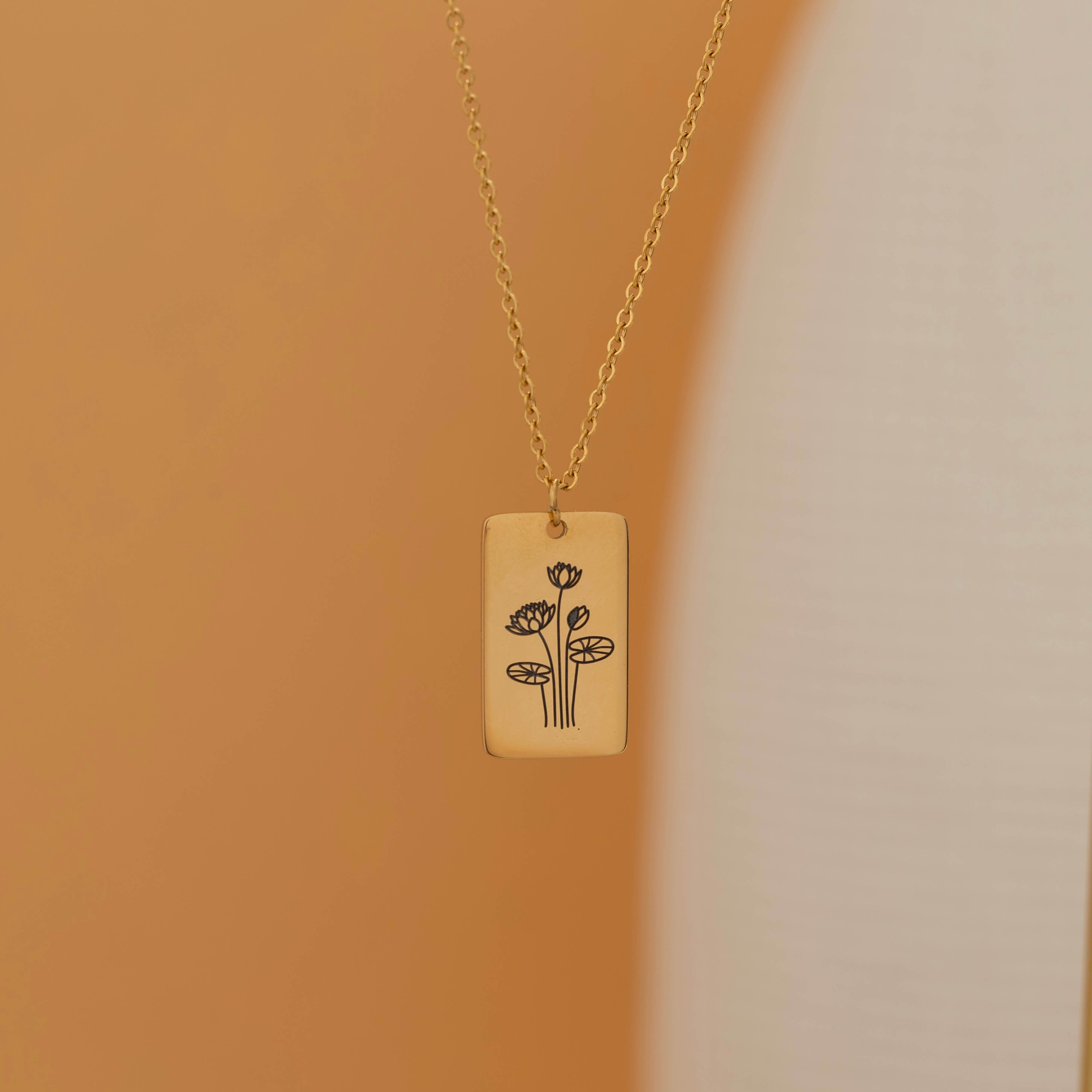 Gold necklace with engraved birth flower pendant, personalized birth month flower jewelry