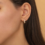 tarnish free pave wavy gold diamond huggie hoops