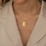 custom hand sign symbol necklaces in gold, silver, and rose gold with engraved rectangular pendants featuring various hand sign designs.