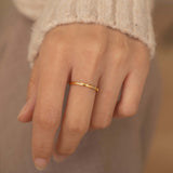 minimalist dainty gold diamond crystal ring for women. it is tarnish free and hypoallergenic 