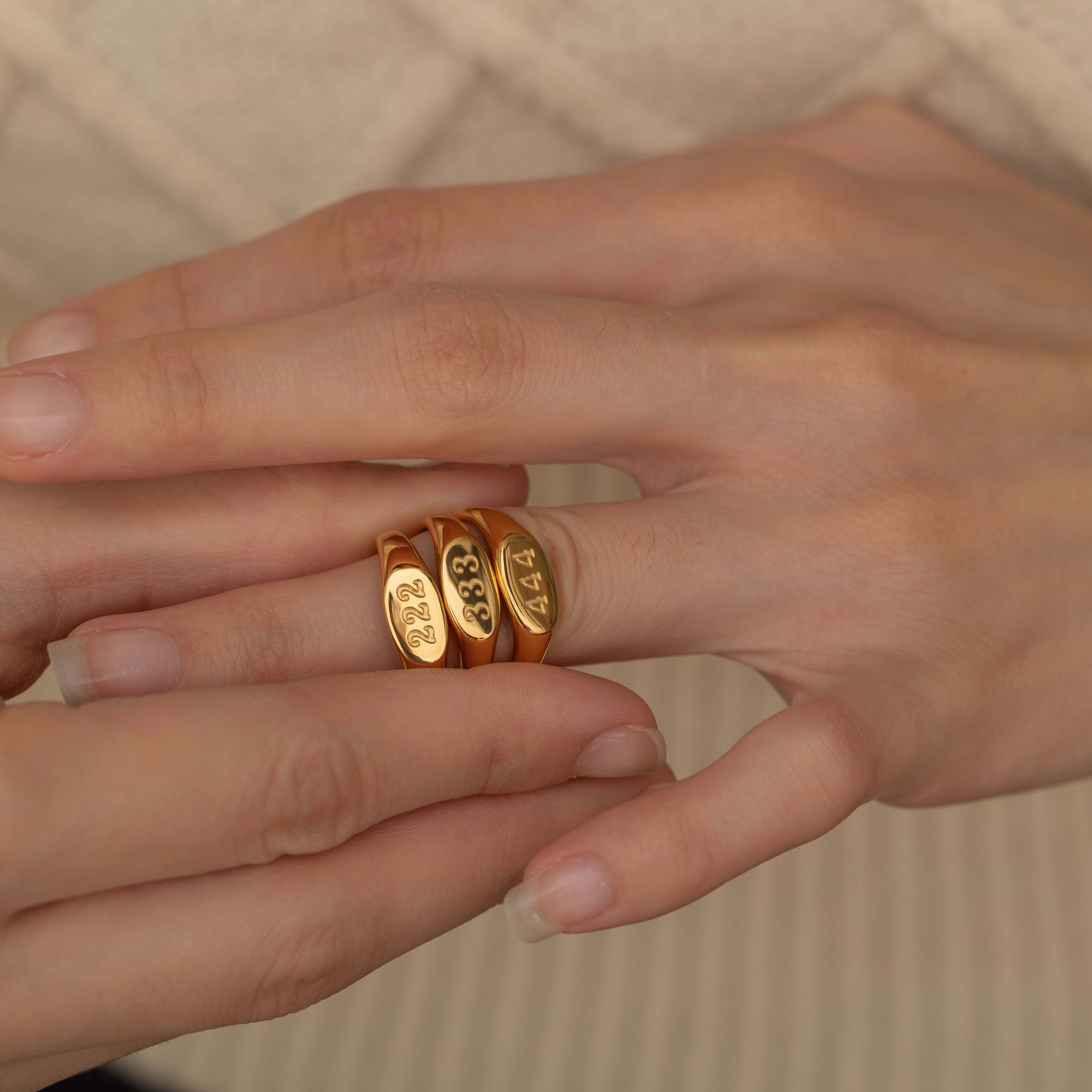 minimalist gold angel number ring for everyday wear since its waterproof and hypoallergenic 