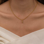 Gold Custom Sunburst Initial Necklace with custom chain styles. Perfect for everyday wear, waterproof and tarnish free