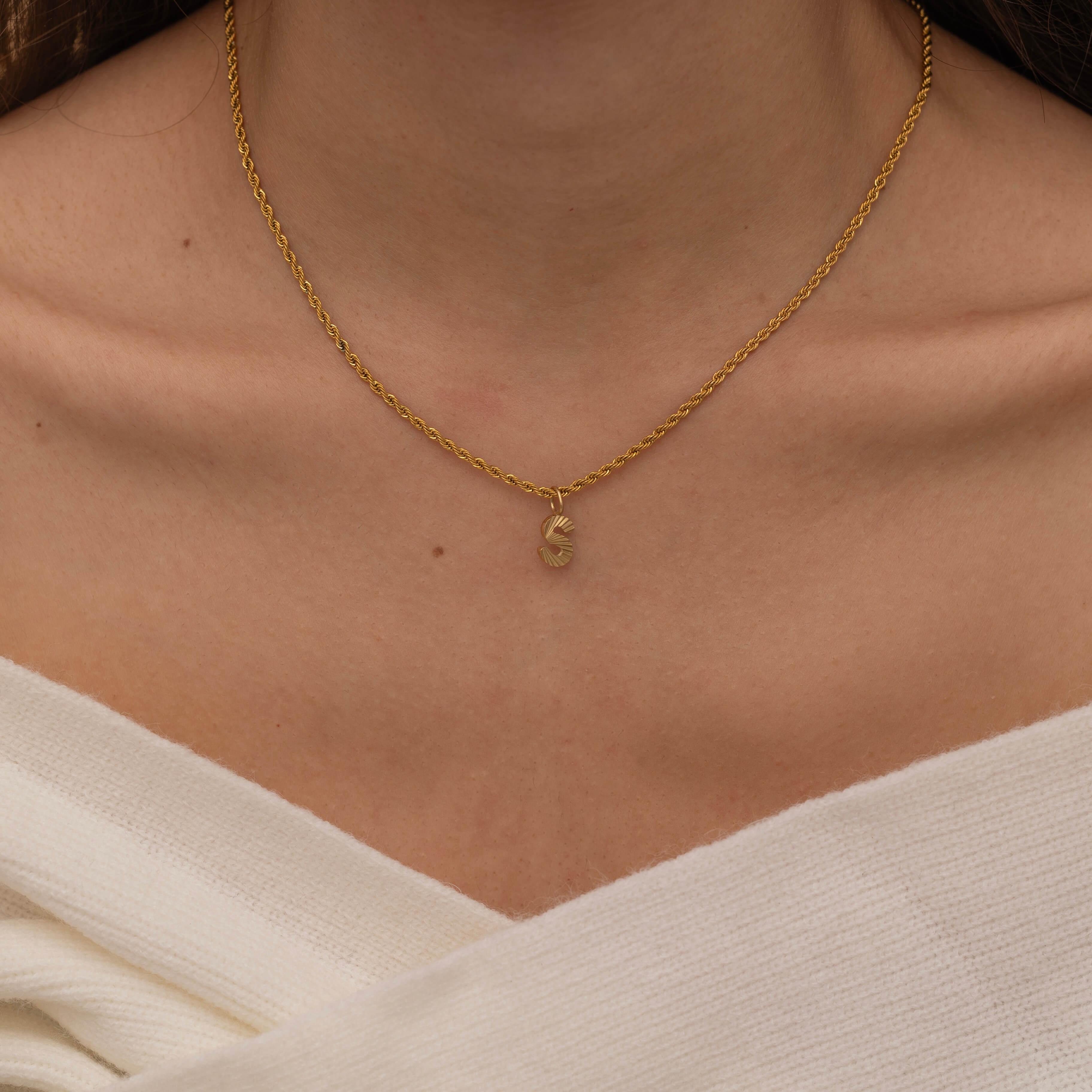 Gold Custom Sunburst Initial Necklace with custom chain styles. Perfect for everyday wear, waterproof and tarnish free