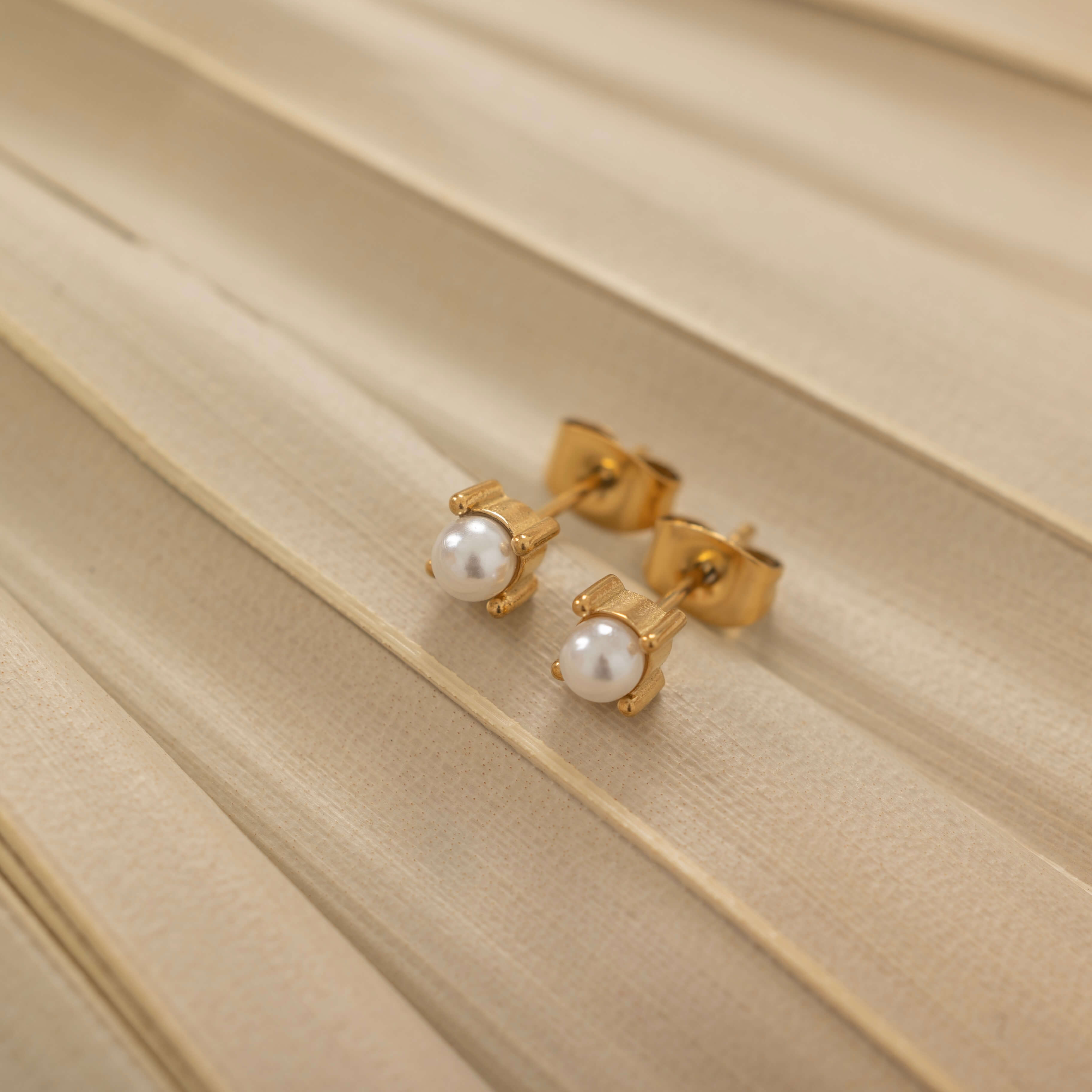dainty gold pearl stud earrings for everyday wear since they are waterproof and made of tarnish free material