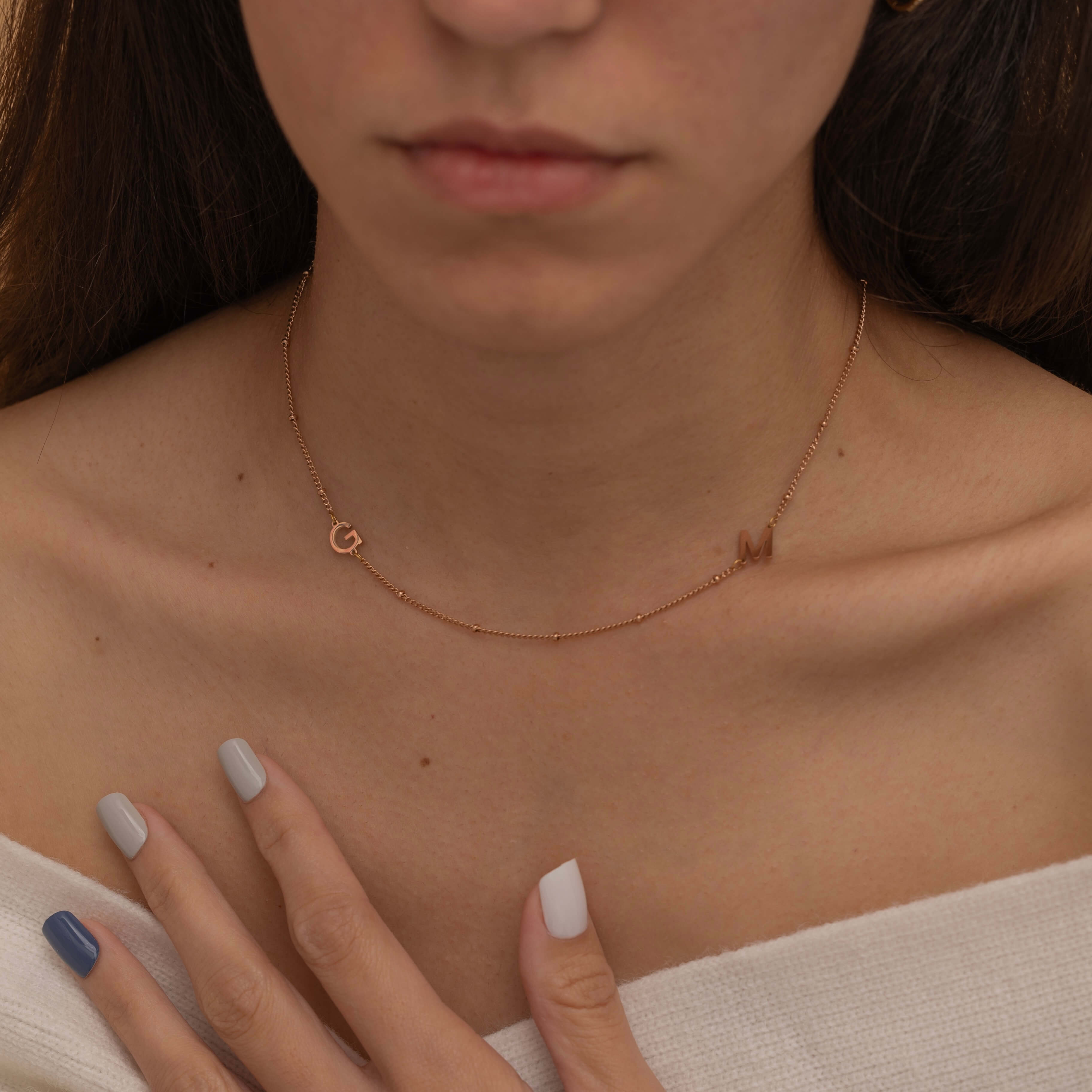 Rose Gold Custom side initial necklace with custom chain styles. It is waterproof and tarnish free. 