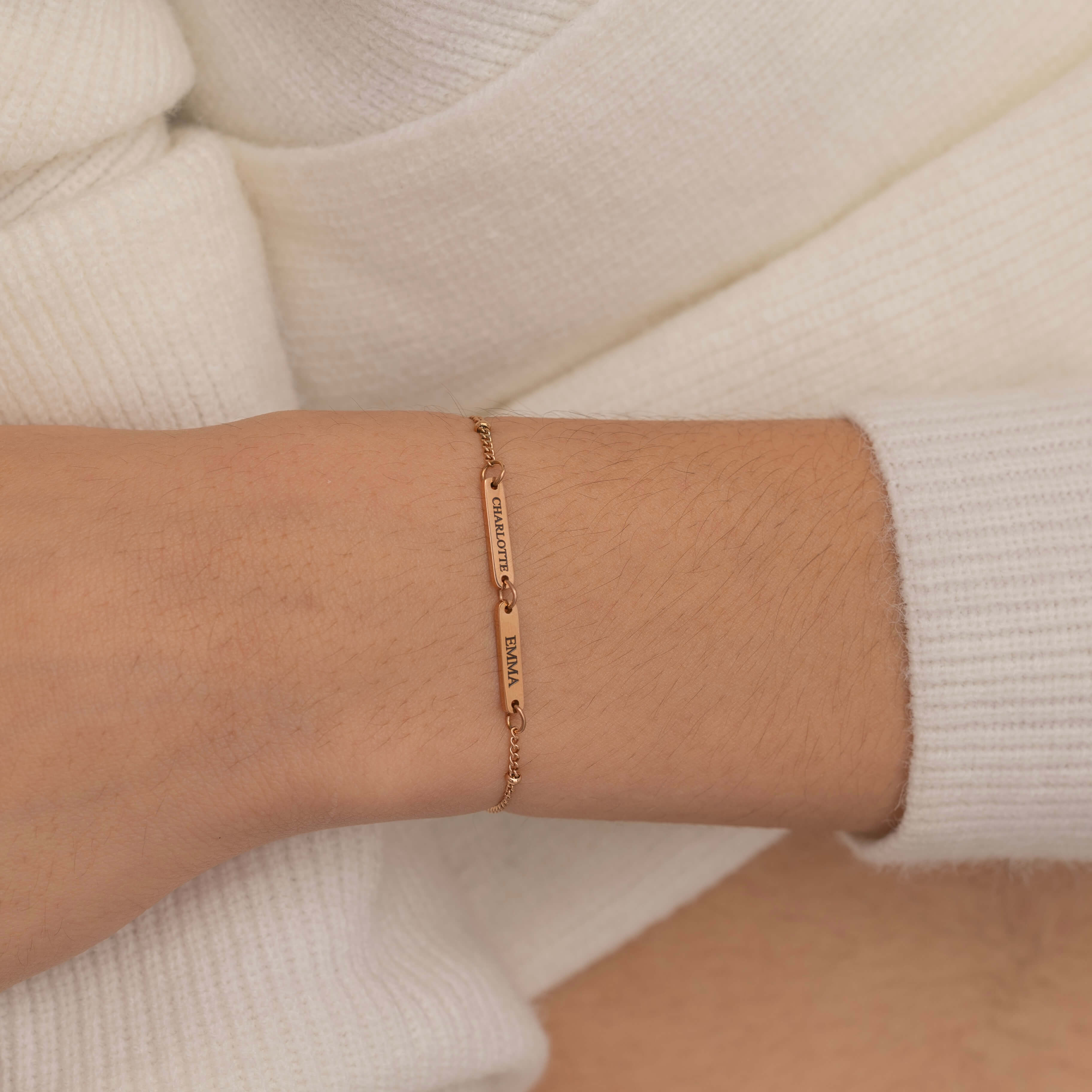 Rose Gold multi-name bar bracelet with customizable engraved bars showcasing its elegant and personalized design.