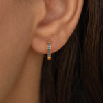 dainty blue sapphire birthstone huggie hoop earrings