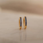 blue gemstone sapphire hoop earrings