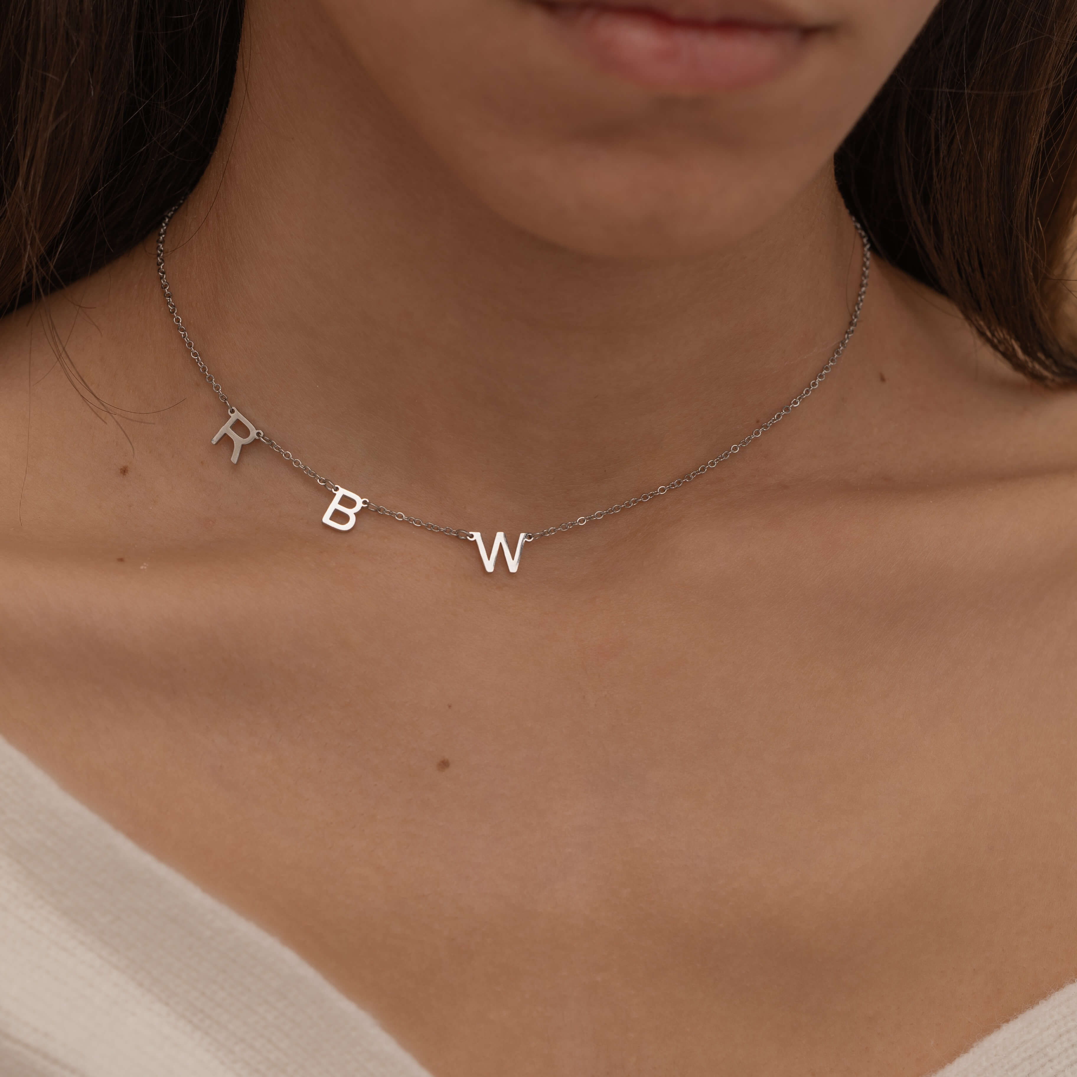 Silver Custom side initial necklace with custom chain styles. It is waterproof and tarnish free. 