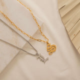 Gold Filled, Silver, and Rose Gold Old English initial charm necklace. Waterproof and tarnish free jewelry