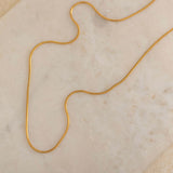 Gold thin snake herringbone necklace perfect for layering