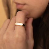 statement gold minimalist signet ring with mother of pearl shell rectangle stone. 