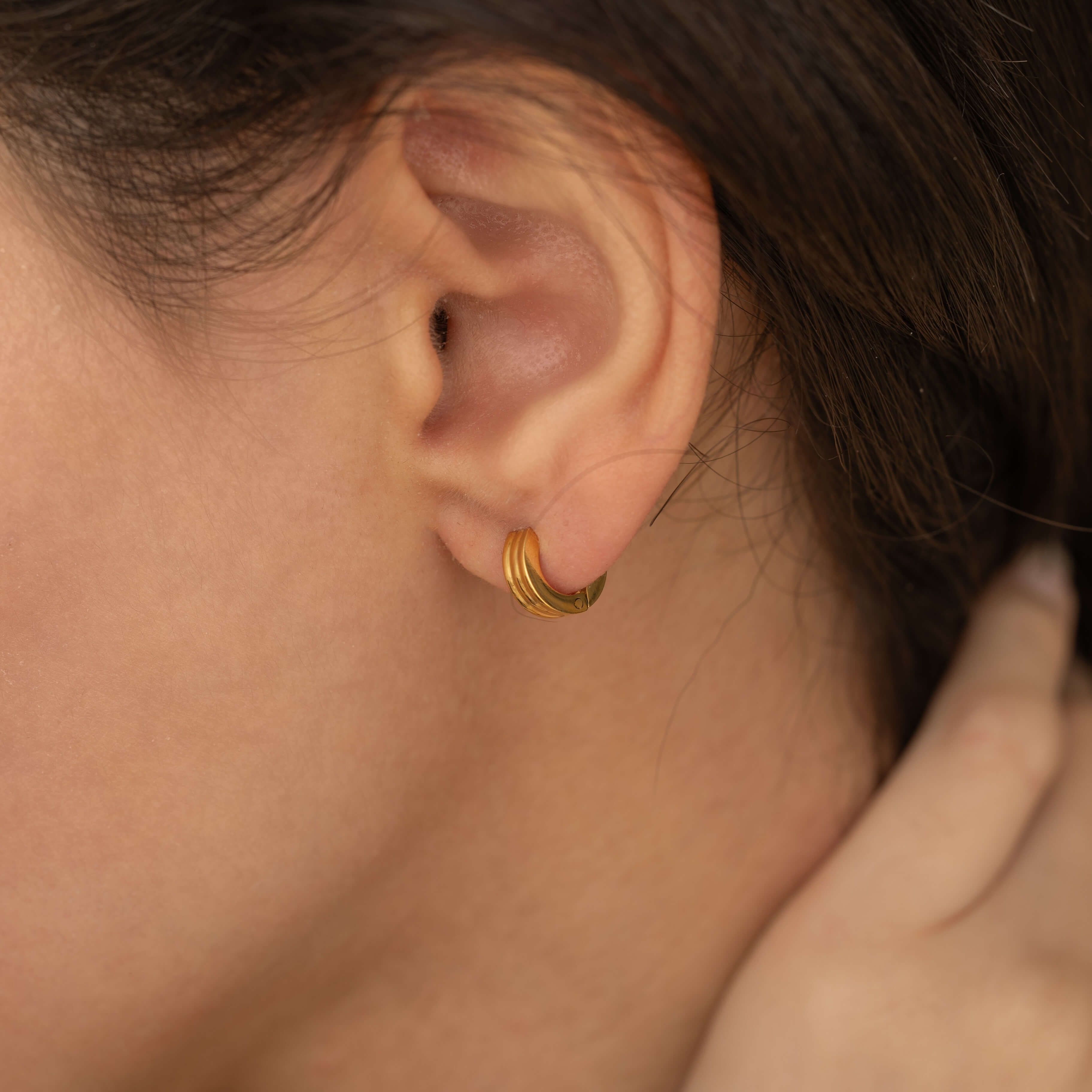 gold tarnish free ribbed huggie hoop earrings