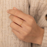 minimalist dainty gold diamond crystal ring for women. it is tarnish free and hypoallergenic 