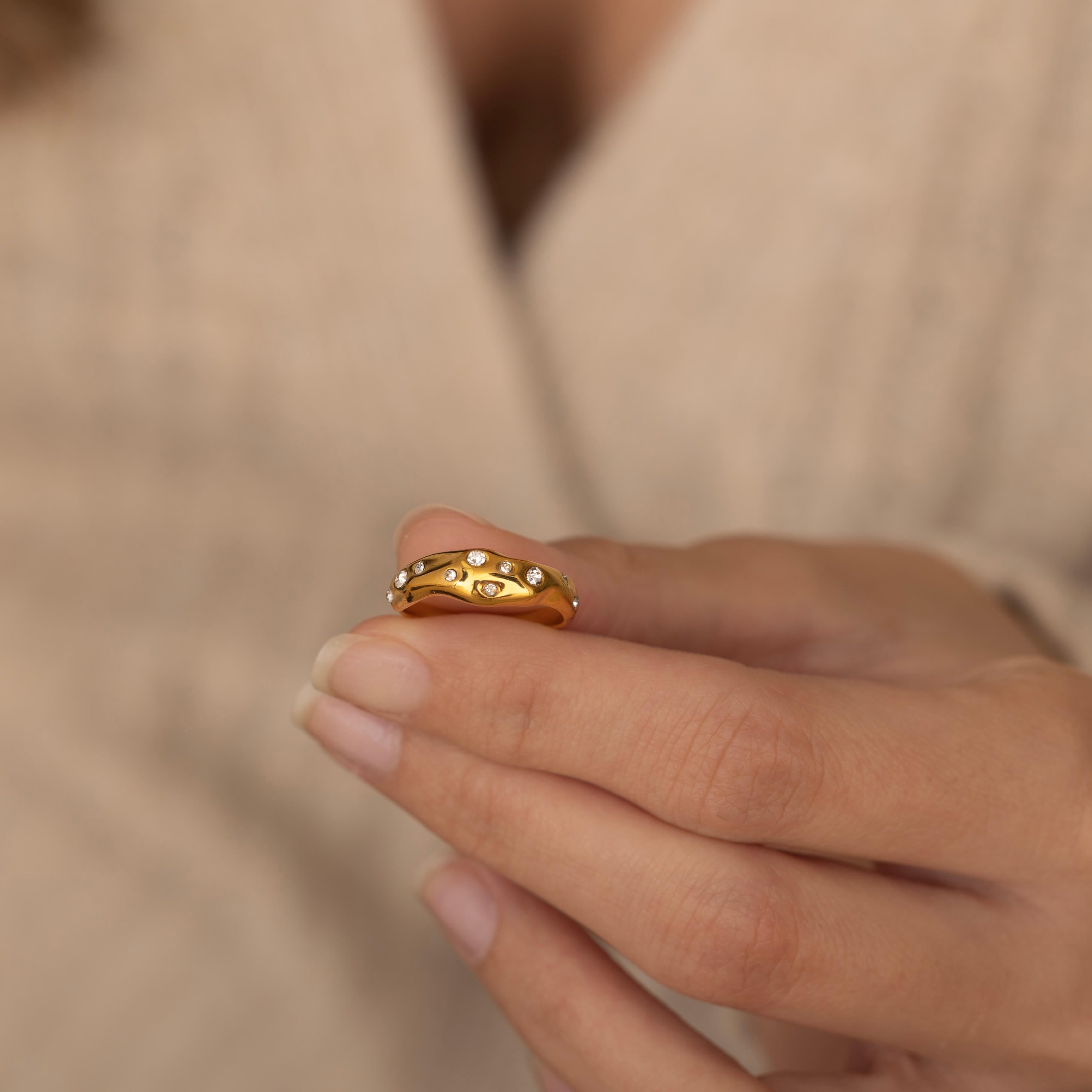 tarnish free gold bold dome ring with diamond stones perfect for layering making it a statement