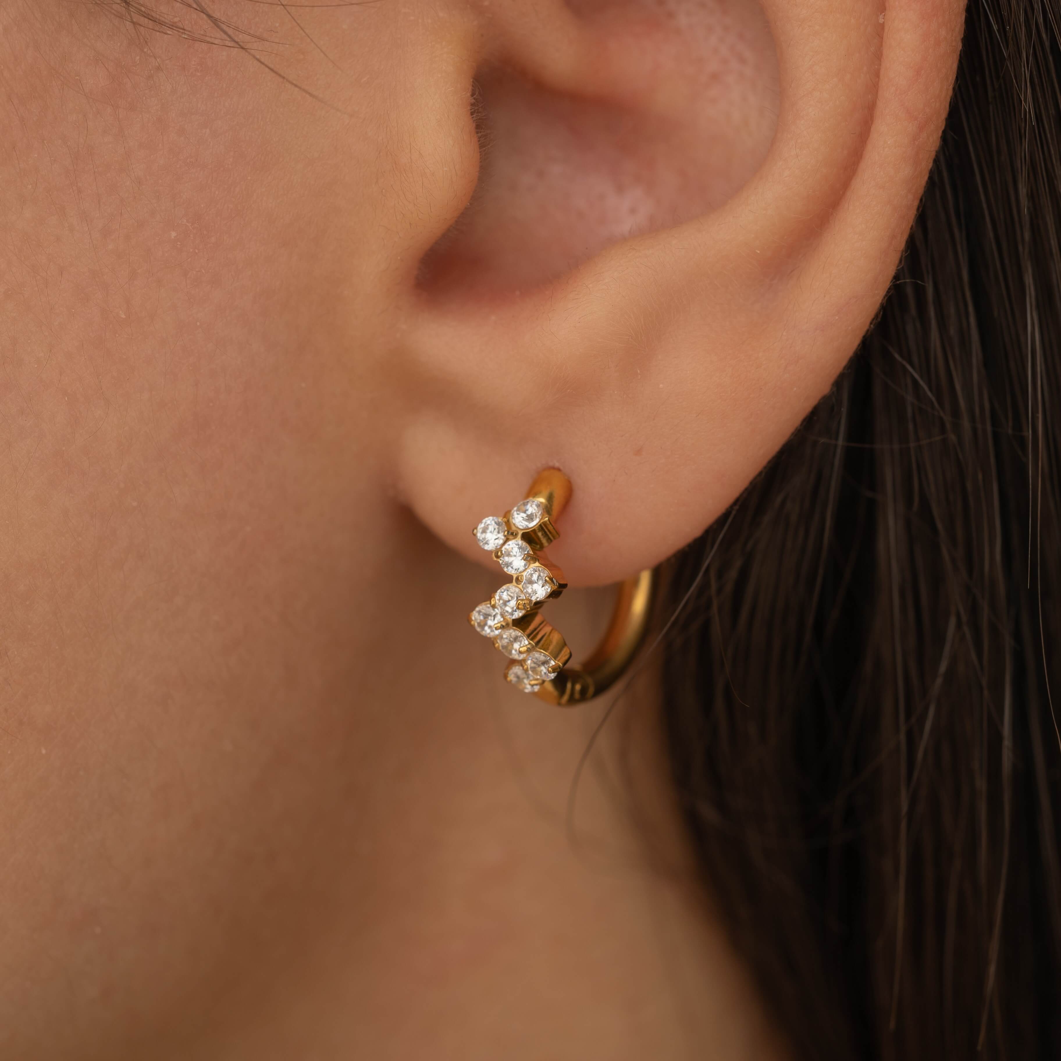 Gold wavy diamond crystal hoop earrings